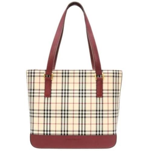 Pre-owned Fabric handbags