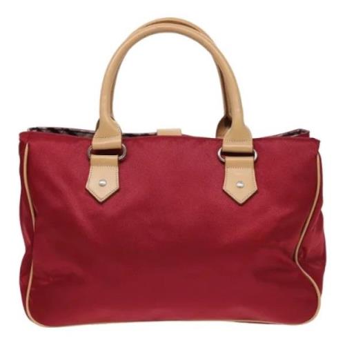 Pre-owned Fabric handbags