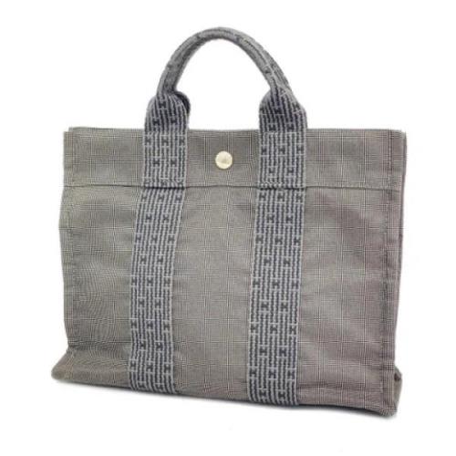 Pre-owned Canvas handbags